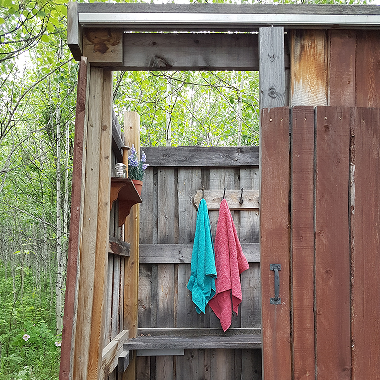 The enterance of our off-grid shower in the Middle of Know-Where